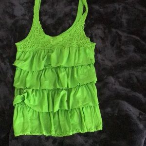 A green ruffly shirt